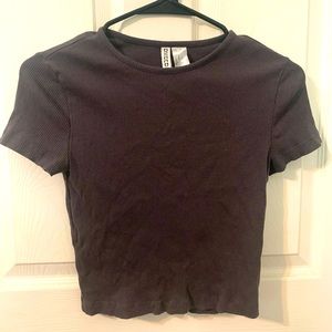 Brand is divided from H&M, was worn a couple times, it’s a crop top.